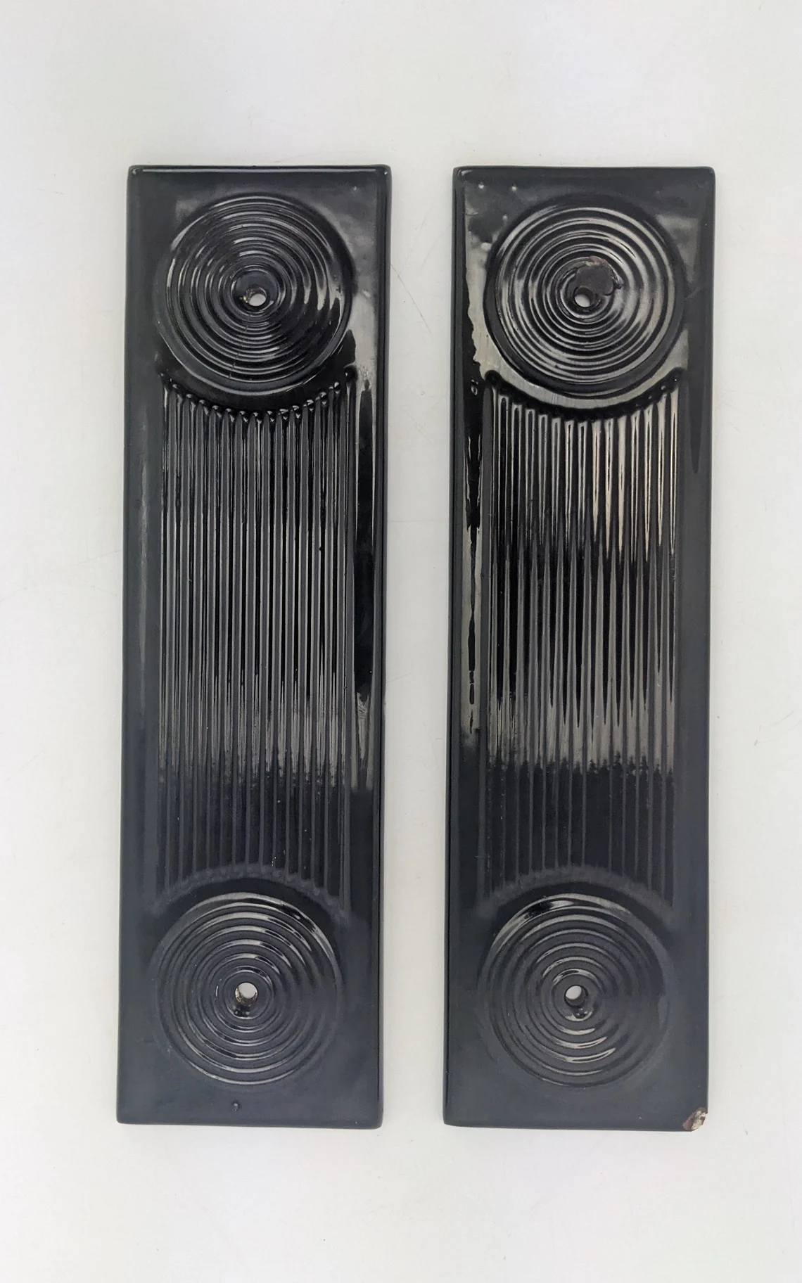 1930s pair of Art Deco black glazed stone internal door push plates