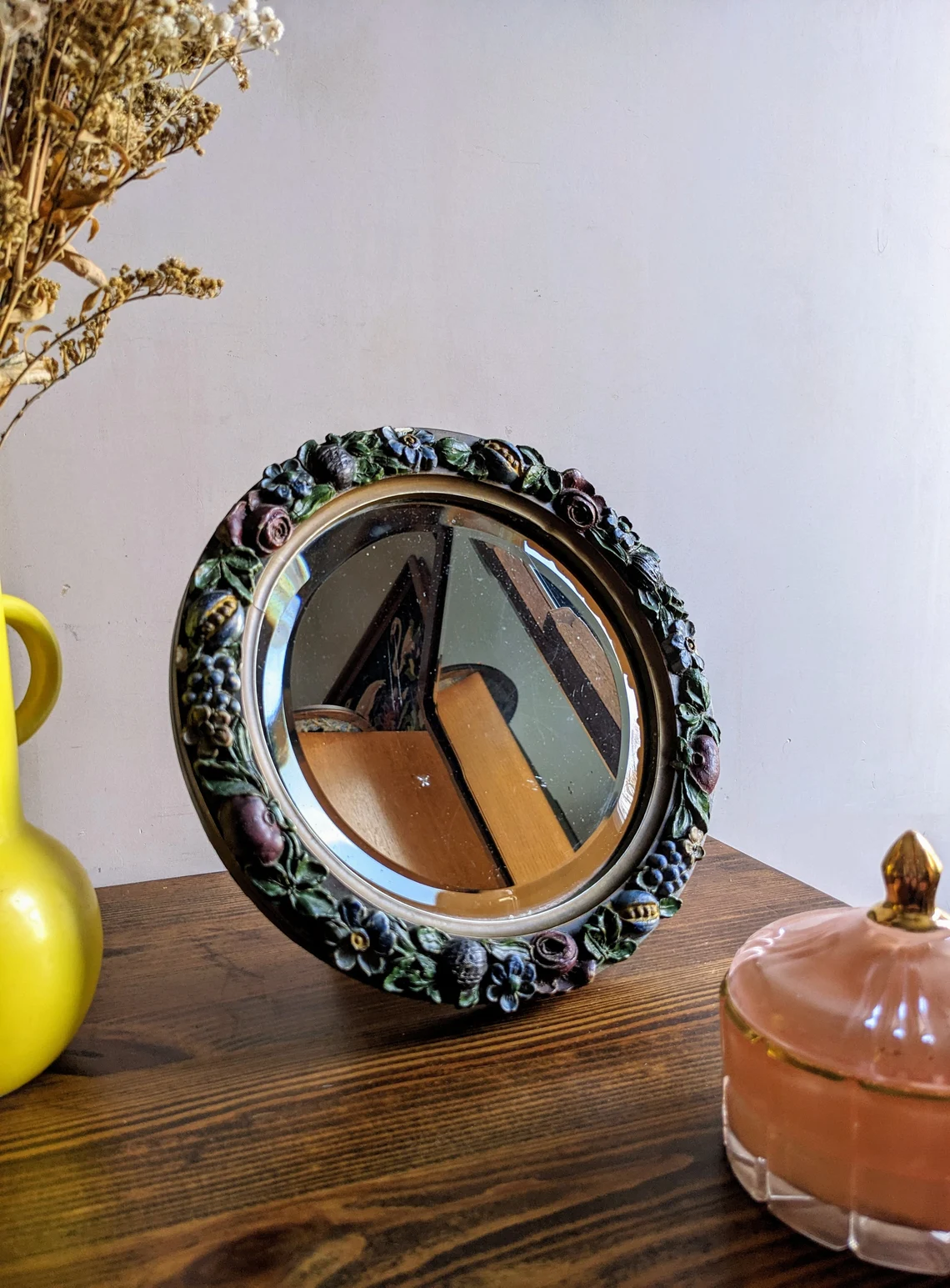 C. 1930s English circular Barbola mirror surrounded by painted plaster flowers