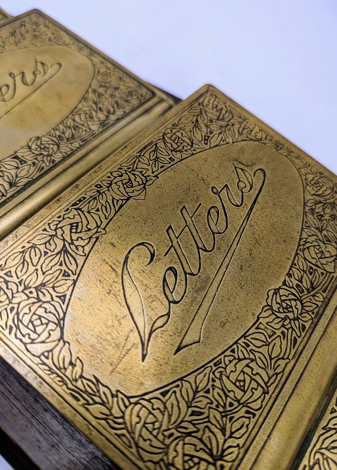 brass and oak Arts and Crafts letter rack