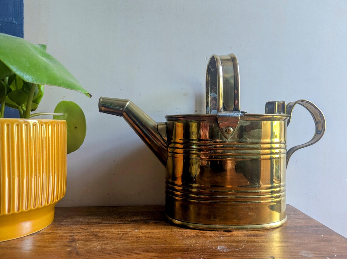 copper watering can