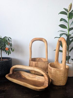 Collection of three one-piece carved wooden bowls