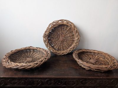 Trio of large wicker-work dishes
