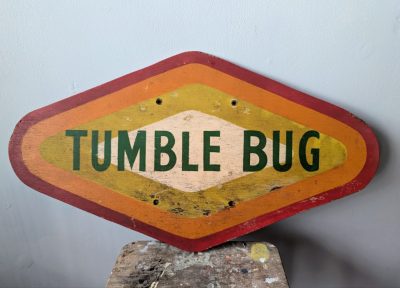 Vintage handpainted colourful fairground sign for the Tumble Bug