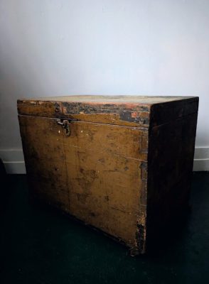 Antique overpainted wooden trunk