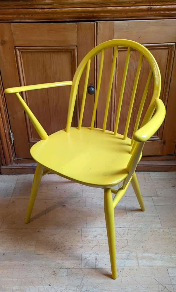 Bright yellow Ercol chair