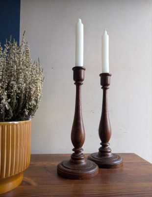 Pair of antique wooden candlesticks with original paintwork