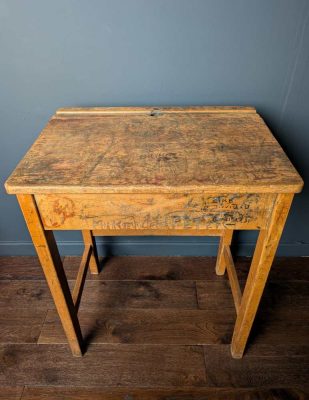 1960s graffitied school desk