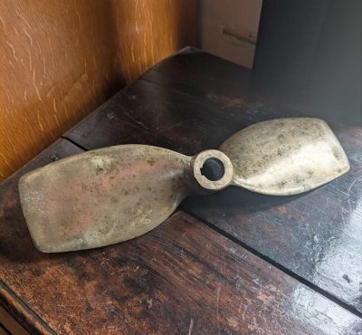 Large solid brass boat propeller as ornament