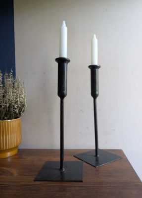 Pair of Indian iron candlesticks