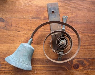 Antique spring door bell