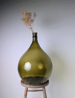 Giant green glass carboy demijohn