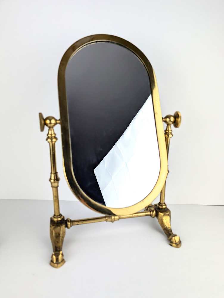 Early-midcentury brass pedestal swing mirror