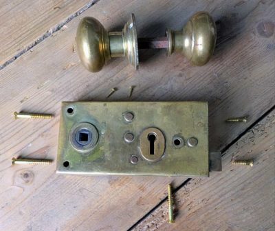 Vintage brass rim lock with pair of brass knobs and fittings
