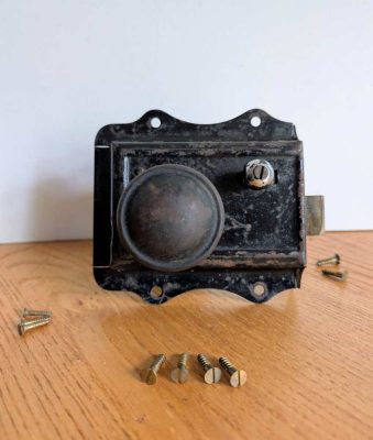 Vintage rim lock with pair of knobs and screws