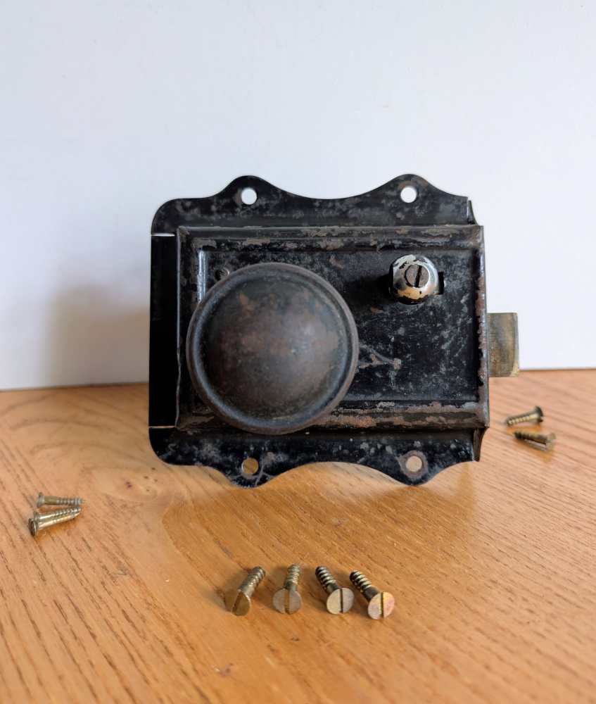 Vintage rim lock with pair of knobs and screws