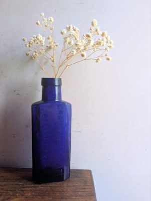 Late Victorian blue glass Citrate of Magnesia bottle