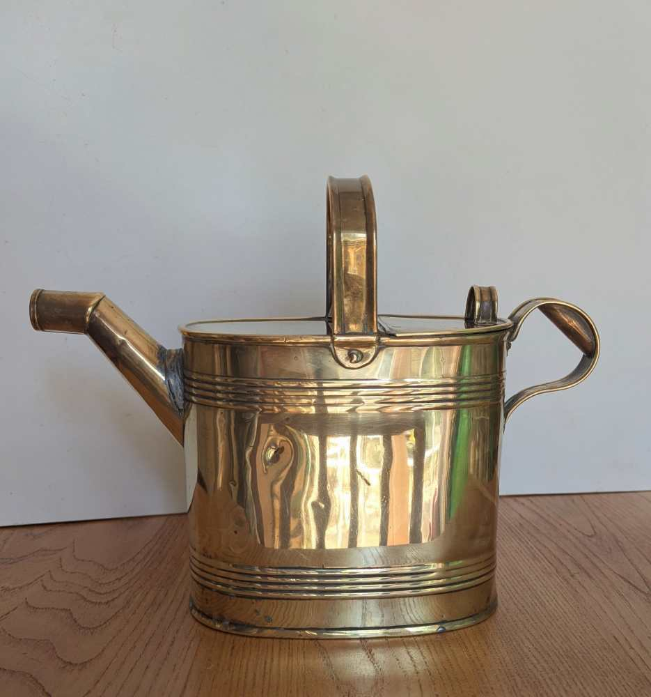 Victorian brass watering can