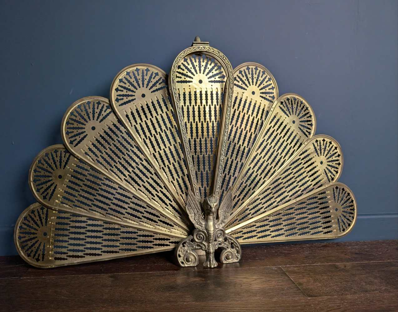 Brass vintage peacock fireguard
