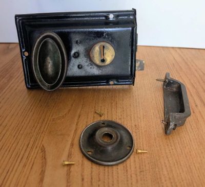 Edwardian rim lock with pair of knobs and brass screws