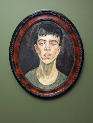Oil on board portrait of a young man