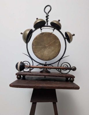 Early 1900s brass and iron dinner gong with bells and original beater