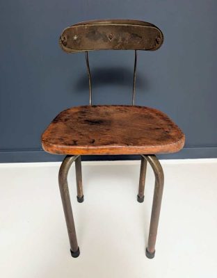 Industrial chair with rotating back rest