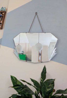 Art Deco frameless mirror with stylish details