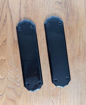 Midcentury original pair of black ceramic internal door push plates
