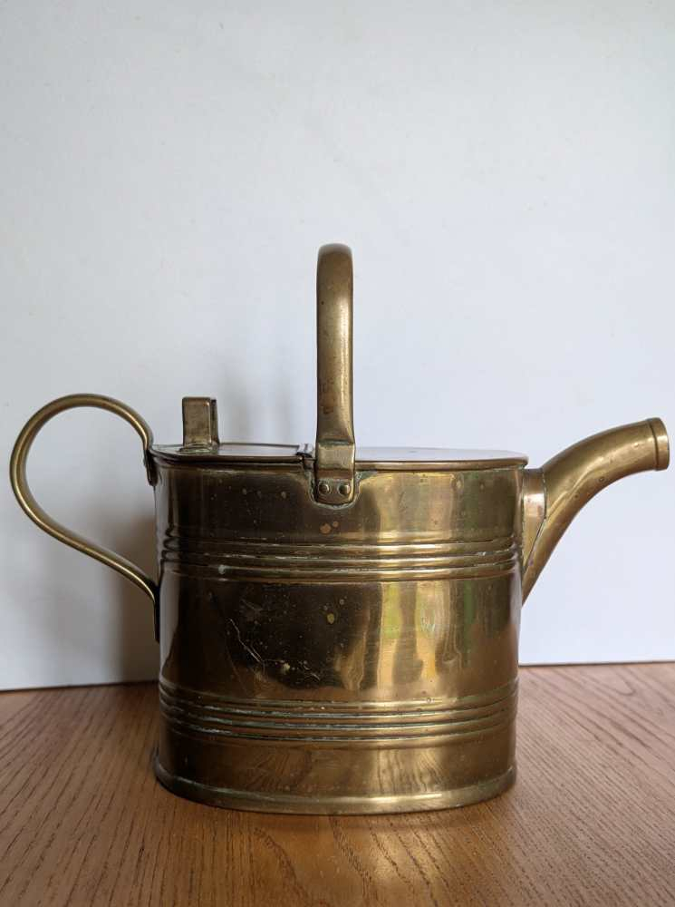 Victorian brass watering can