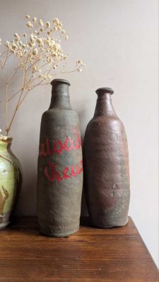 Pair of c.18th century French stoneware Calvados bottles