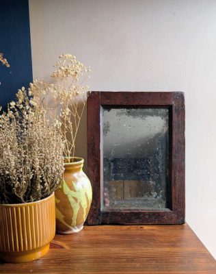 19th c. heavily foxed mirror in oak frame