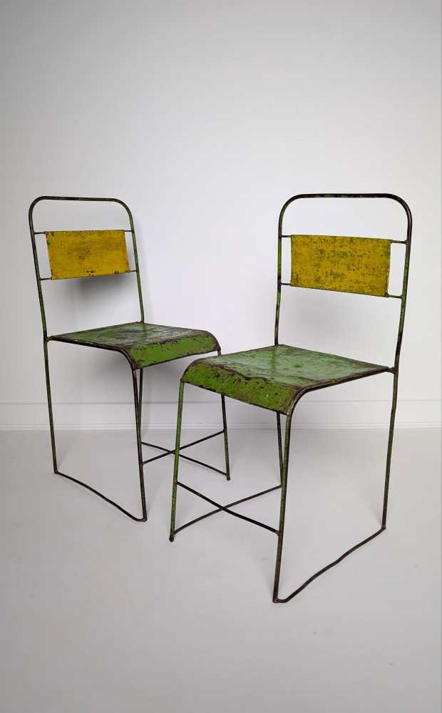 Pair of midcentury industrial painted metal chairs