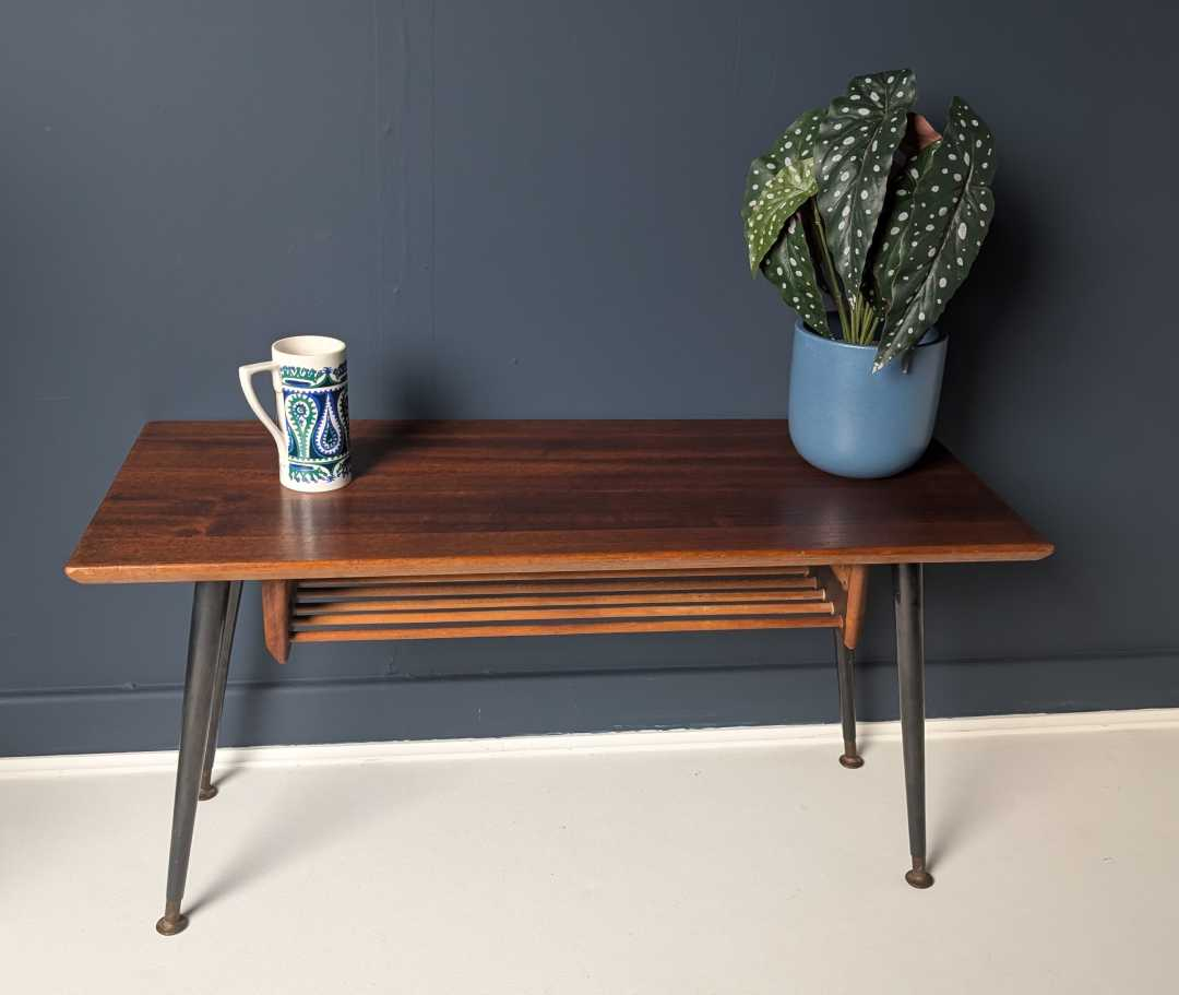 Midcentury teak coffee table with magazine shelf