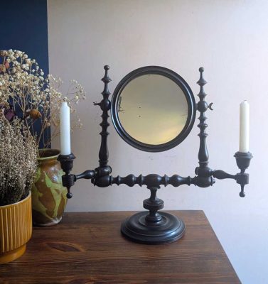 19th century tilting mirror with candle sconces