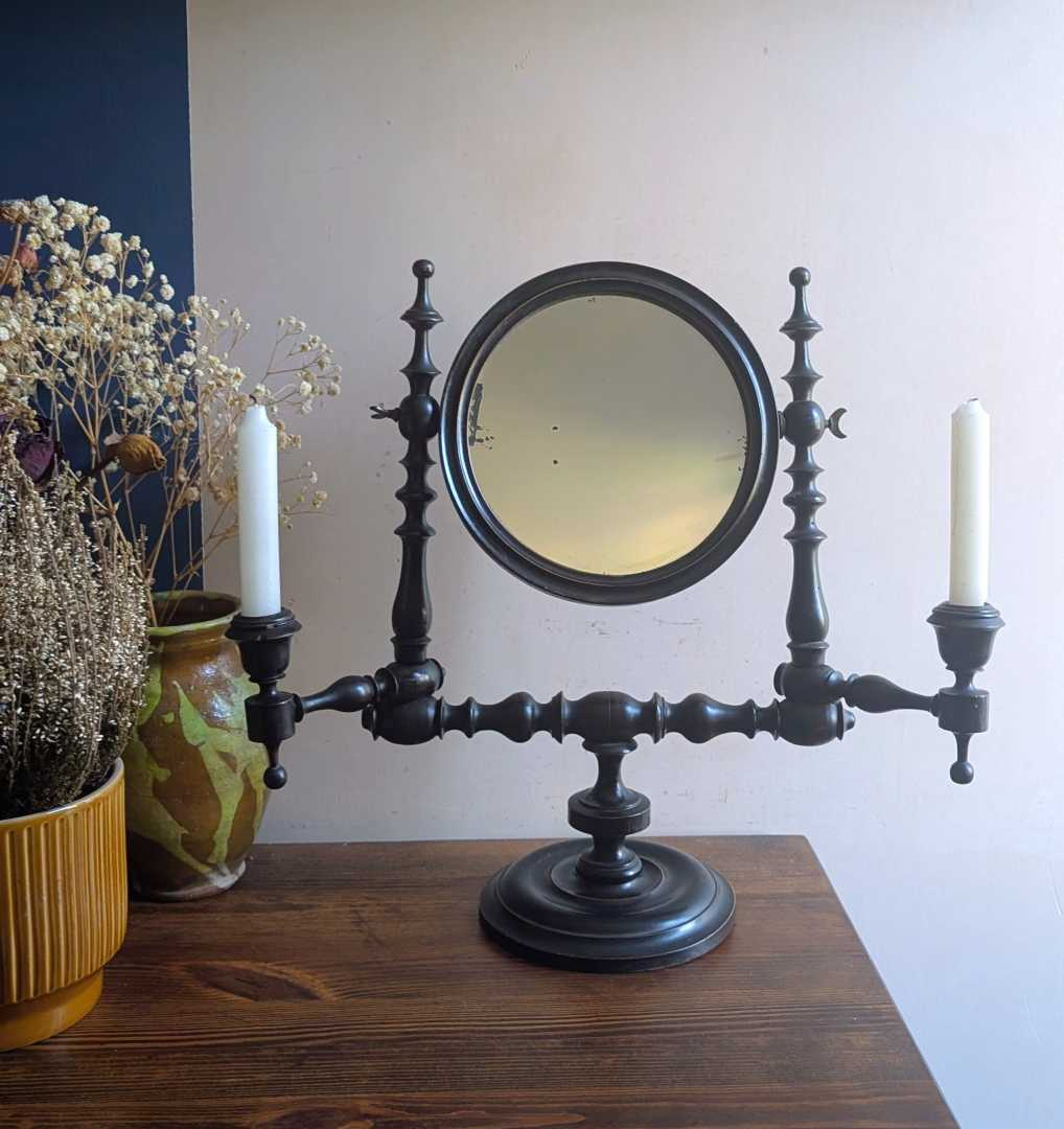 19th century tilting mirror with candle sconces