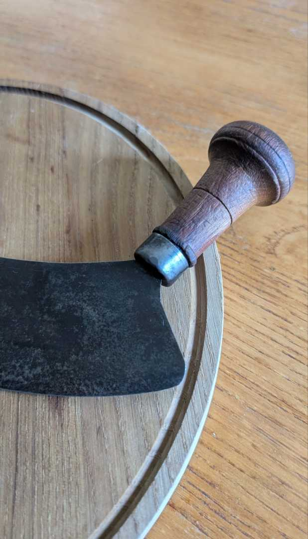 French herb cutter, or Mezzaluna